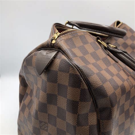 réparation sac louis vuitton prix